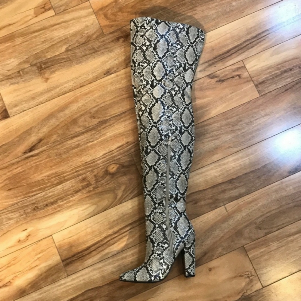 Snake print thigh boot.